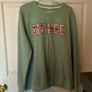 Nurse floral stitched crewneck sweatshirt
